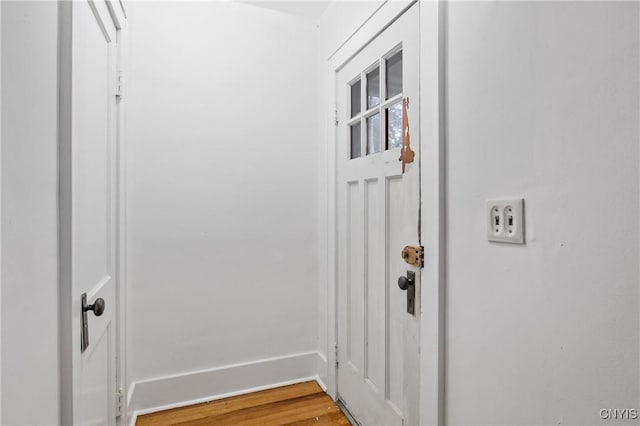 201 Mosley Dr, Syracuse, NY 13206 - doorway featuring wood finished floors and baseboards