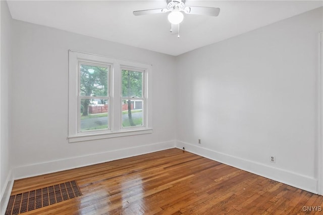 201 Mosley Dr, Syracuse, NY 13206 - spare room with wood finished floors and a ceiling fan