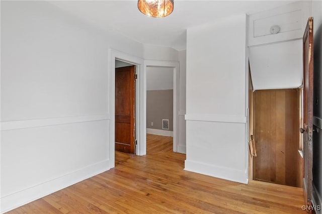 201 Mosley Dr, Syracuse, NY 13206 - spare room with light wood-style floors and baseboards