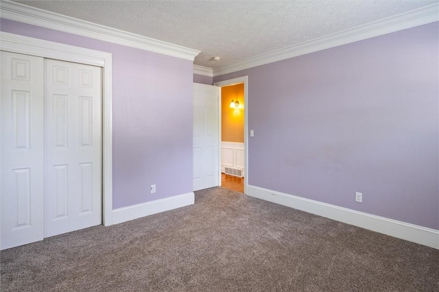 179 Down St, Henrietta, NY 14623 - unfurnished bedroom featuring carpet floors, a closet, crown molding, and a textured ceiling