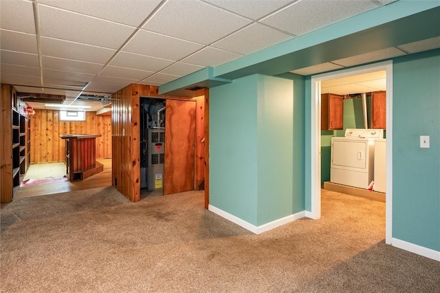 179 Down St, Henrietta, NY 14623 - basement with washer and dryer, carpet, a drop ceiling, wooden walls, and a dry bar