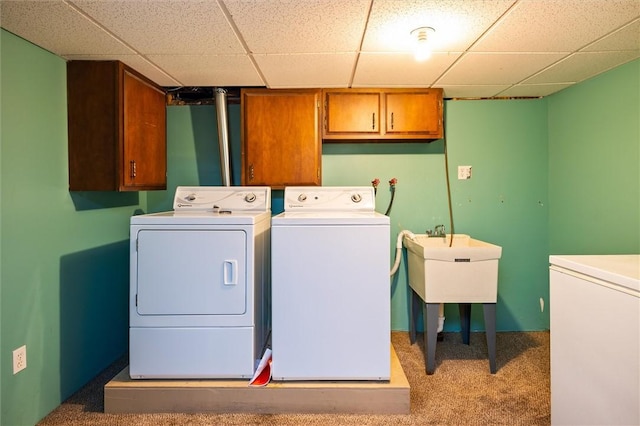 179 Down St, Henrietta, NY 14623 - laundry area with cabinet space, washer and clothes dryer, and carpet flooring