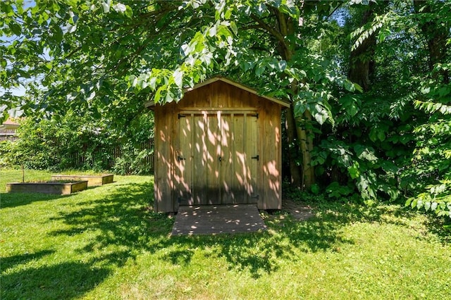 179 Down St, Henrietta, NY 14623 - view of shed with a vegetable garden