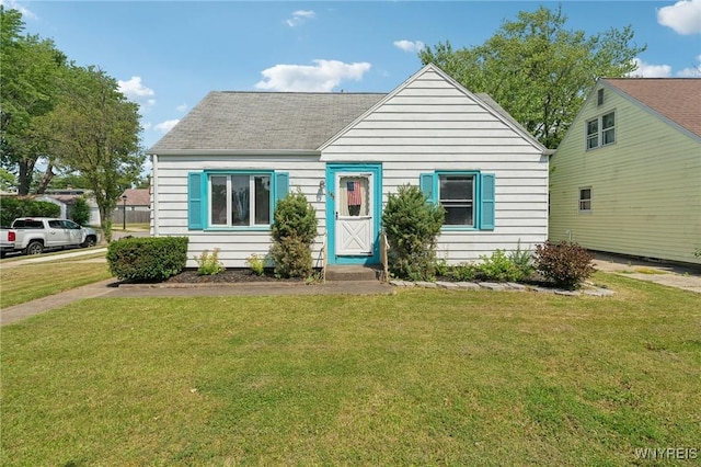 167 Somerville Ave, Tonawanda, NY 14150 - bungalow-style house featuring a front lawn and roof with shingles