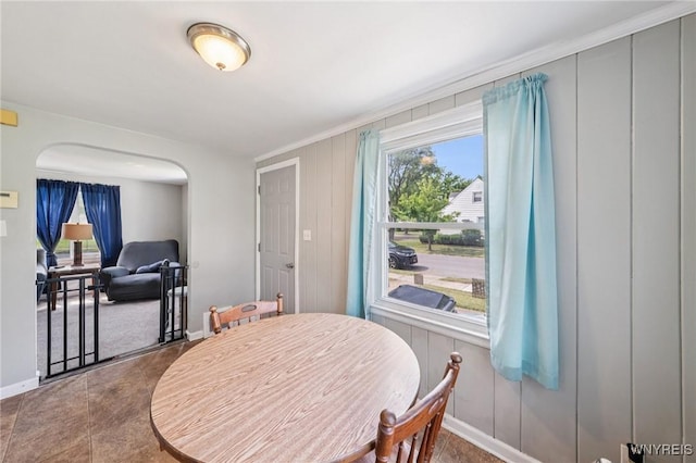 167 Somerville Ave, Tonawanda, NY 14150 - dining space featuring arched walkways and baseboards