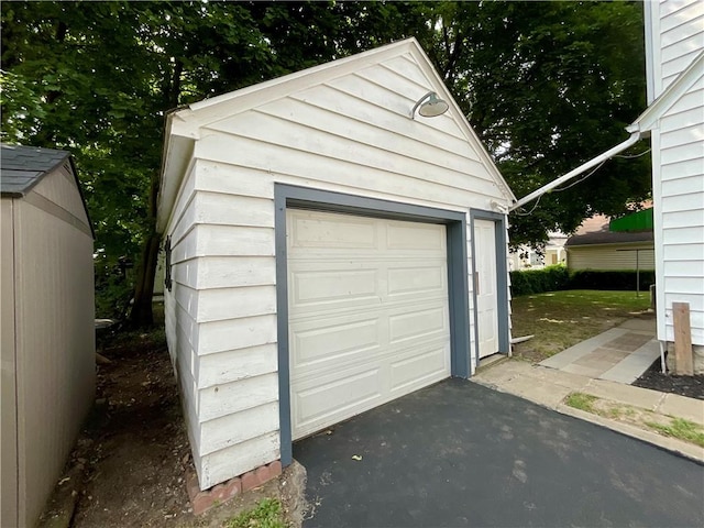2 Washington St, North Dansville, NY 14437 - detached garage with driveway