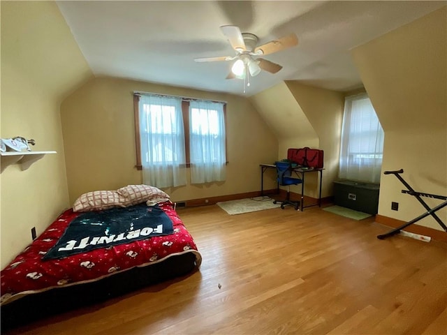 2 Washington St, North Dansville, NY 14437 - bedroom featuring wood finished floors and vaulted ceiling