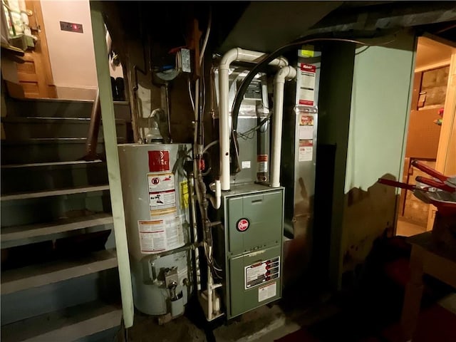 2 Washington St, North Dansville, NY 14437 - utility room with water heater