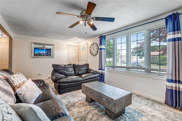 1416 99th St, Niagara Falls, NY 14304 - living area with a ceiling fan and wood finished floors