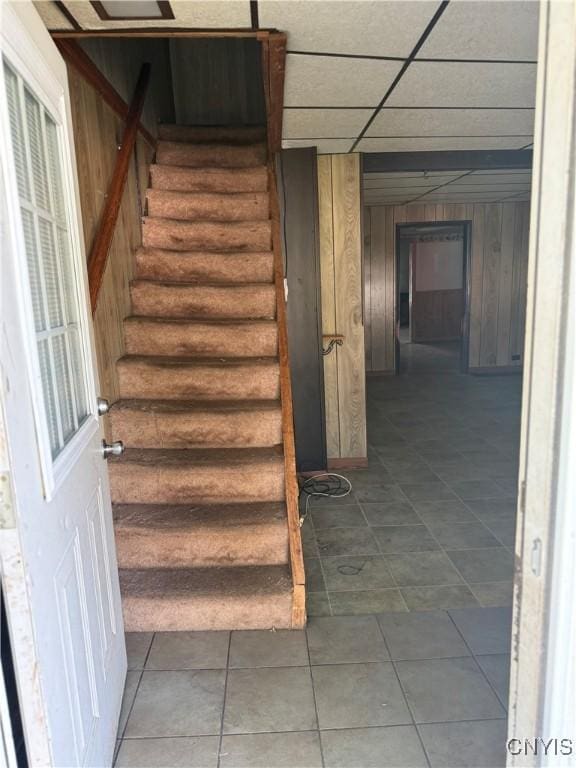 211 W Park St, Lenox, NY 13032 - stairs with tile patterned floors and wooden walls