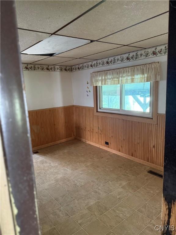 211 W Park St, Lenox, NY 13032 - unfurnished room featuring wainscoting