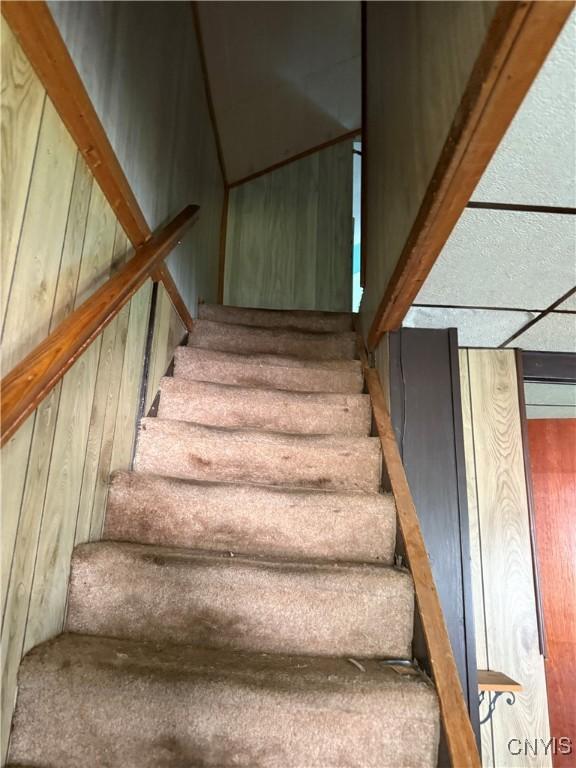 211 W Park St, Lenox, NY 13032 - stairs with wood walls