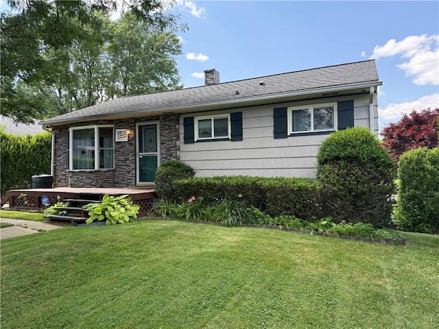 890 Holdridge St, Southport, NY 14904 - view of front facade featuring a chimney and a front yard