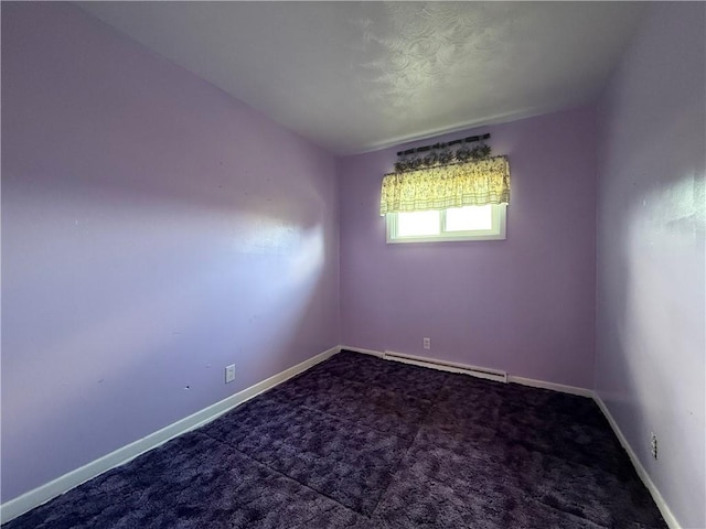890 Holdridge St, Southport, NY 14904 - carpeted spare room with baseboard heating and baseboards