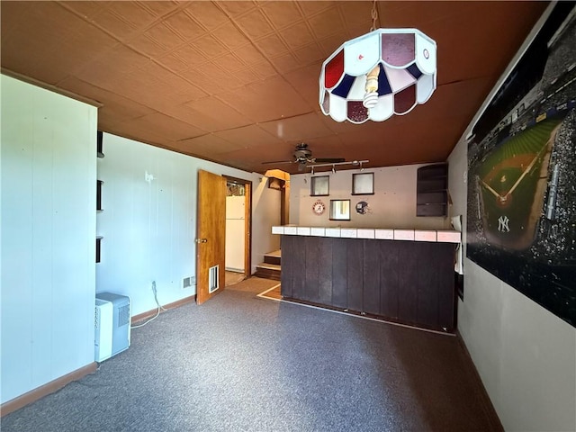 890 Holdridge St, Southport, NY 14904 - indoor dry bar with a ceiling fan and freestanding refrigerator