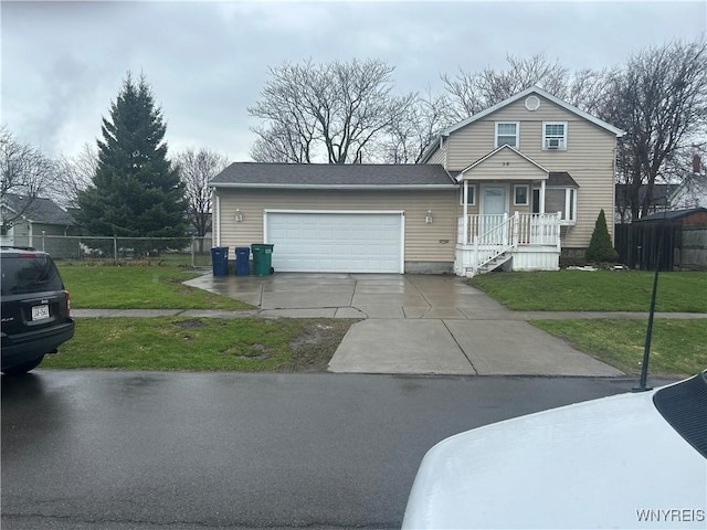 38 Hines St, Buffalo, NY 14220 - view of front of home featuring concrete driveway and a garage