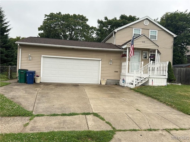 38 Hines St, Buffalo, NY 14220 - view of front of property featuring an attached garage and concrete driveway