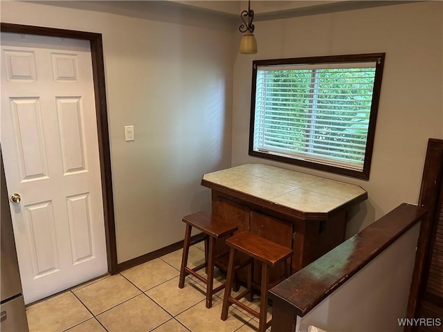 38 Hines St, Buffalo, NY 14220 - dining space featuring light tile patterned floors and baseboards