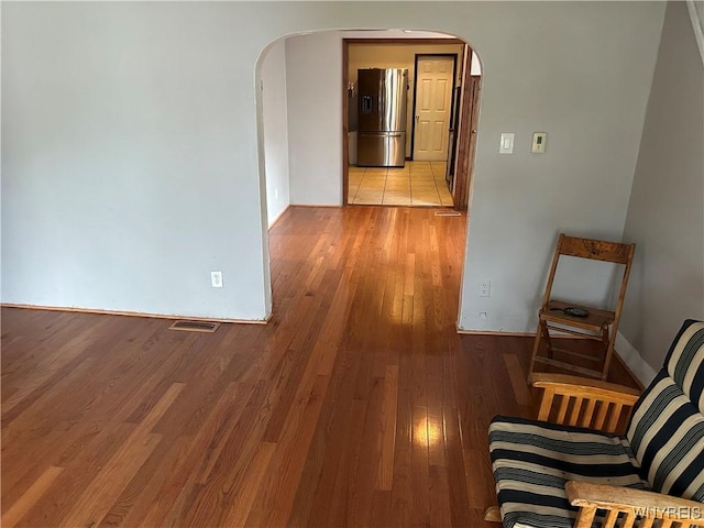 38 Hines St, Buffalo, NY 14220 - corridor featuring arched walkways and light wood-style flooring