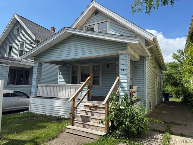 83 Custer St, Buffalo, NY 14214 - view of front facade featuring a porch