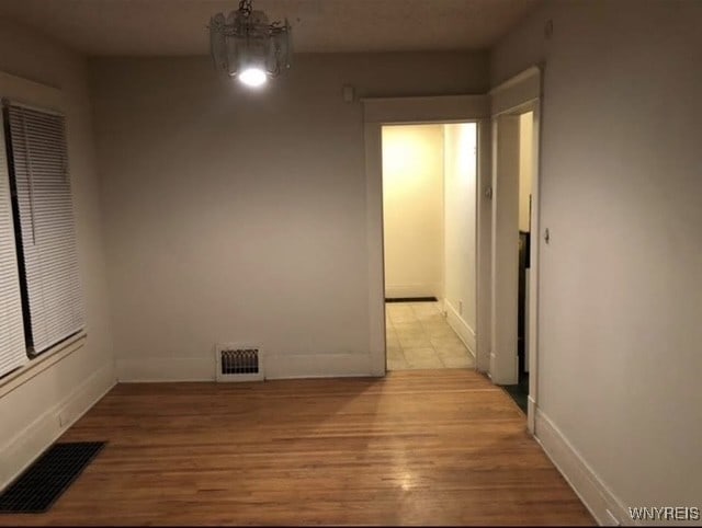 83 Custer St, Buffalo, NY 14214 - empty room featuring wood finished floors