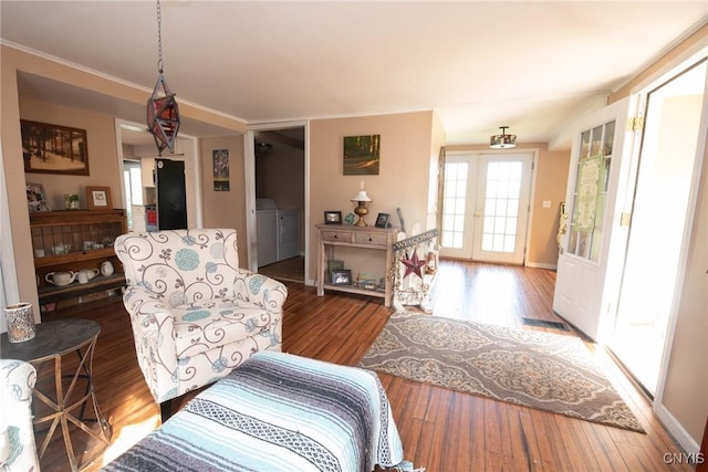 1109 Church Rd, Lysander, NY 13027 - living room with separate washer and dryer and wood finished floors