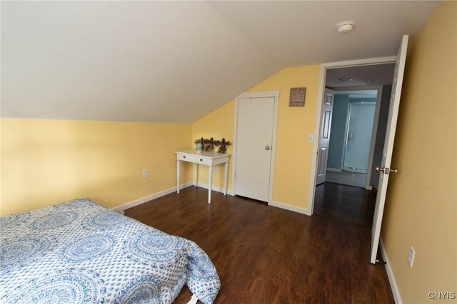 1109 Church Rd, Lysander, NY 13027 - bedroom featuring dark wood finished floors and lofted ceiling