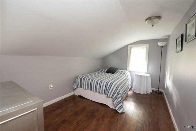 1109 Church Rd, Lysander, NY 13027 - bedroom with vaulted ceiling and dark wood-type flooring