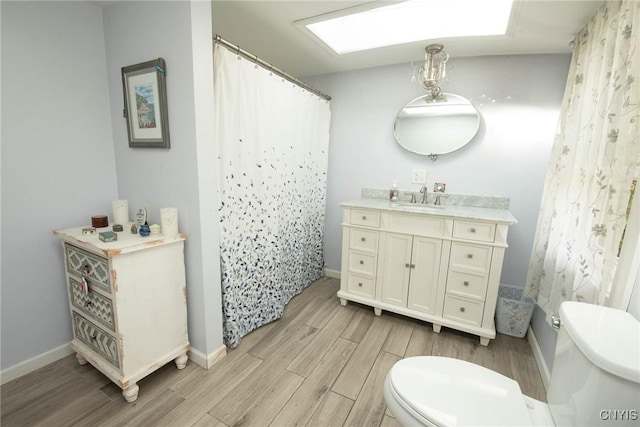 1109 Church Rd, Lysander, NY 13027 - bathroom featuring wood finished floors, vanity, and curtained shower