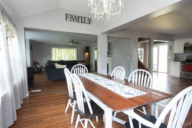 1109 Church Rd, Lysander, NY 13027 - dining area featuring plenty of natural light, a chandelier, wood finished floors, and vaulted ceiling
