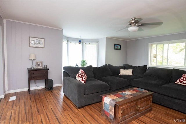 1109 Church Rd, Lysander, NY 13027 - living room with healthy amount of natural light, wood finished floors, a ceiling fan, and crown molding