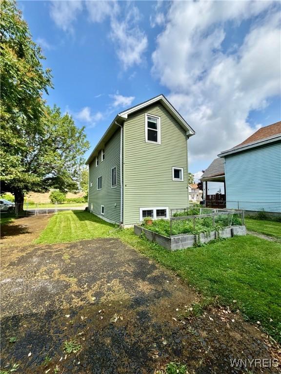 39 Klas Ave, West Seneca, NY 14224 - view of home's exterior with a garden