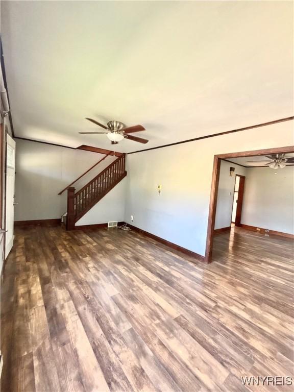 39 Klas Ave, West Seneca, NY 14224 - unfurnished living room with ceiling fan, wood finished floors, and stairway