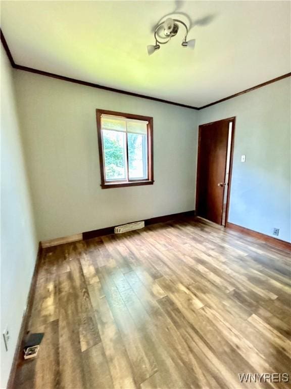 39 Klas Ave, West Seneca, NY 14224 - empty room with ornamental molding and wood finished floors