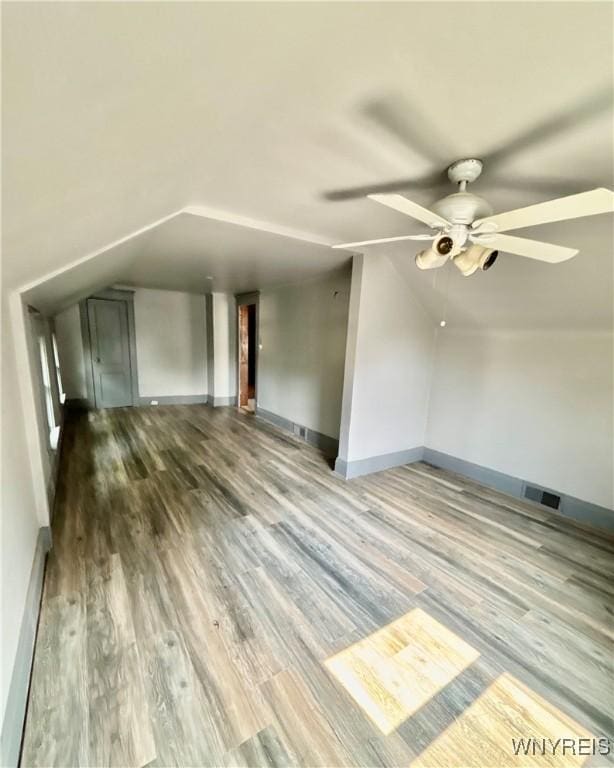 39 Klas Ave, West Seneca, NY 14224 - bonus room with wood finished floors, ceiling fan, lofted ceiling, and a baseboard heating unit