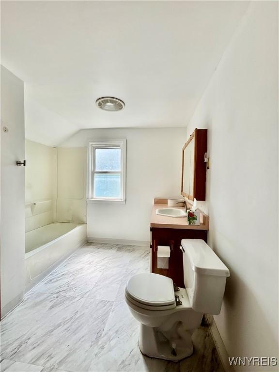 39 Klas Ave, West Seneca, NY 14224 - full bathroom featuring vanity, lofted ceiling, and a tub