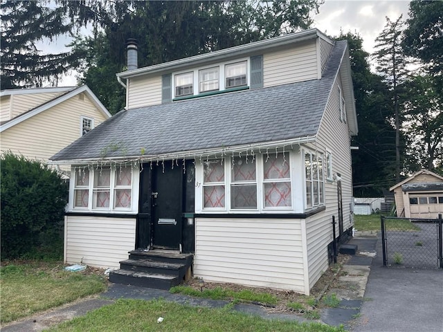 37 Outlook Dr, Irondequoit, NY 14622 - view of front of house featuring entry steps and roof with shingles