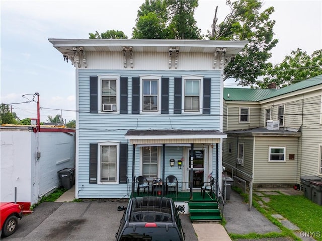 103 Stanwix St, Rome, NY 13440 - view of front of house with a porch and cooling unit