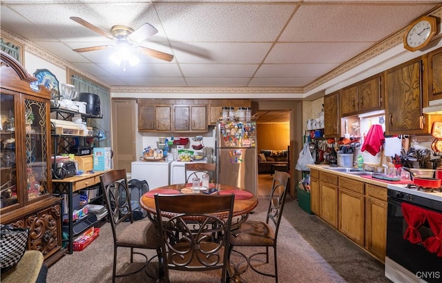 103 Stanwix St, Rome, NY 13440 - carpeted dining room with independent washer and dryer, ceiling fan, and a drop ceiling