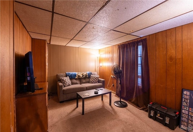 103 Stanwix St, Rome, NY 13440 - living room featuring carpet flooring, wooden walls, and a paneled ceiling