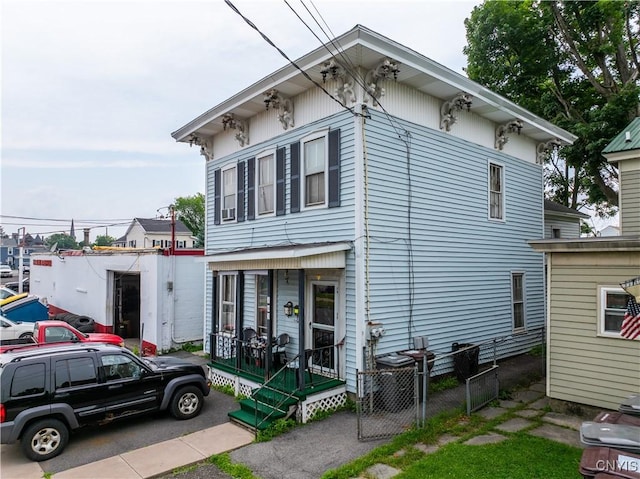 103 Stanwix St, Rome, NY 13440 - italianate house featuring a gate