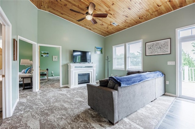 7156 County Line Rd, Naples, NY 14512 - living room with vaulted ceiling, ceiling fan, wooden ceiling, and a fireplace