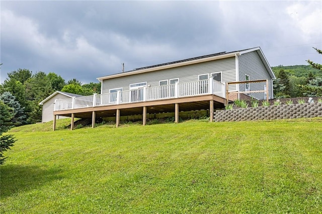 7156 County Line Rd, Naples, NY 14512 - rear view of property featuring a deck and a yard