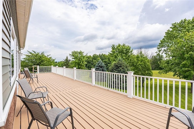 7156 County Line Rd, Naples, NY 14512 - wooden deck with a lawn and view of wooded area