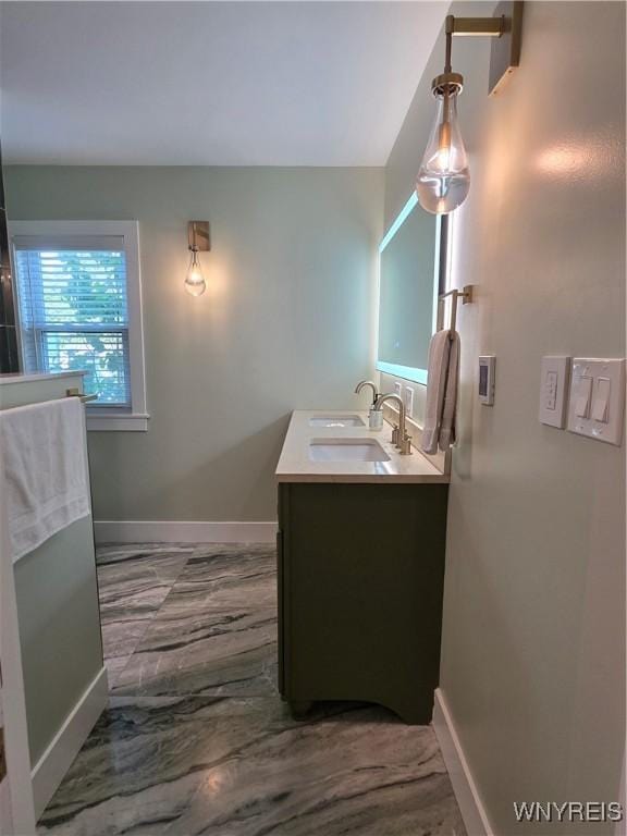 4049 River Rd, Lewiston, NY 14174 - bathroom with double vanity and marble finish flooring