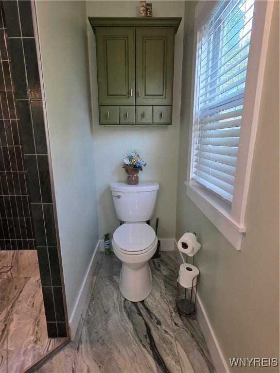4049 River Rd, Lewiston, NY 14174 - bathroom with a tile shower and marble look tiles