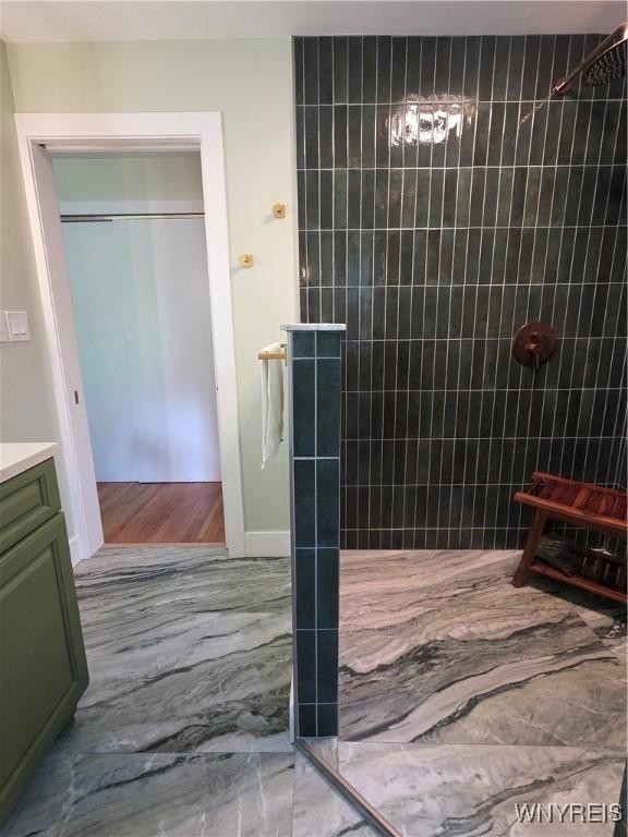4049 River Rd, Lewiston, NY 14174 - bathroom with vanity and a tile shower