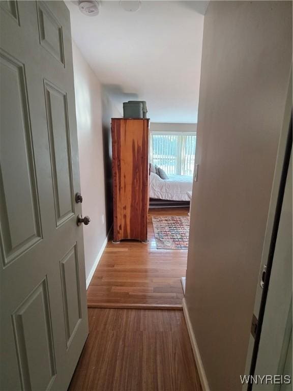 4049 River Rd, Lewiston, NY 14174 - hall featuring baseboards and wood finished floors