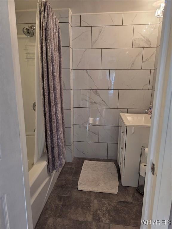 4049 River Rd, Lewiston, NY 14174 - bathroom with vanity, tile walls, and shower / bath combo with shower curtain
