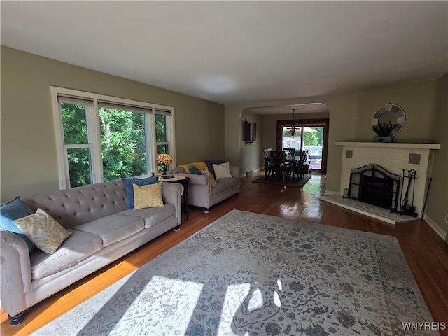 4049 River Rd, Lewiston, NY 14174 - living area with arched walkways and wood finished floors